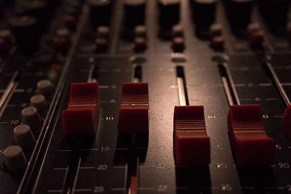 Mixing Board with Red Faders
